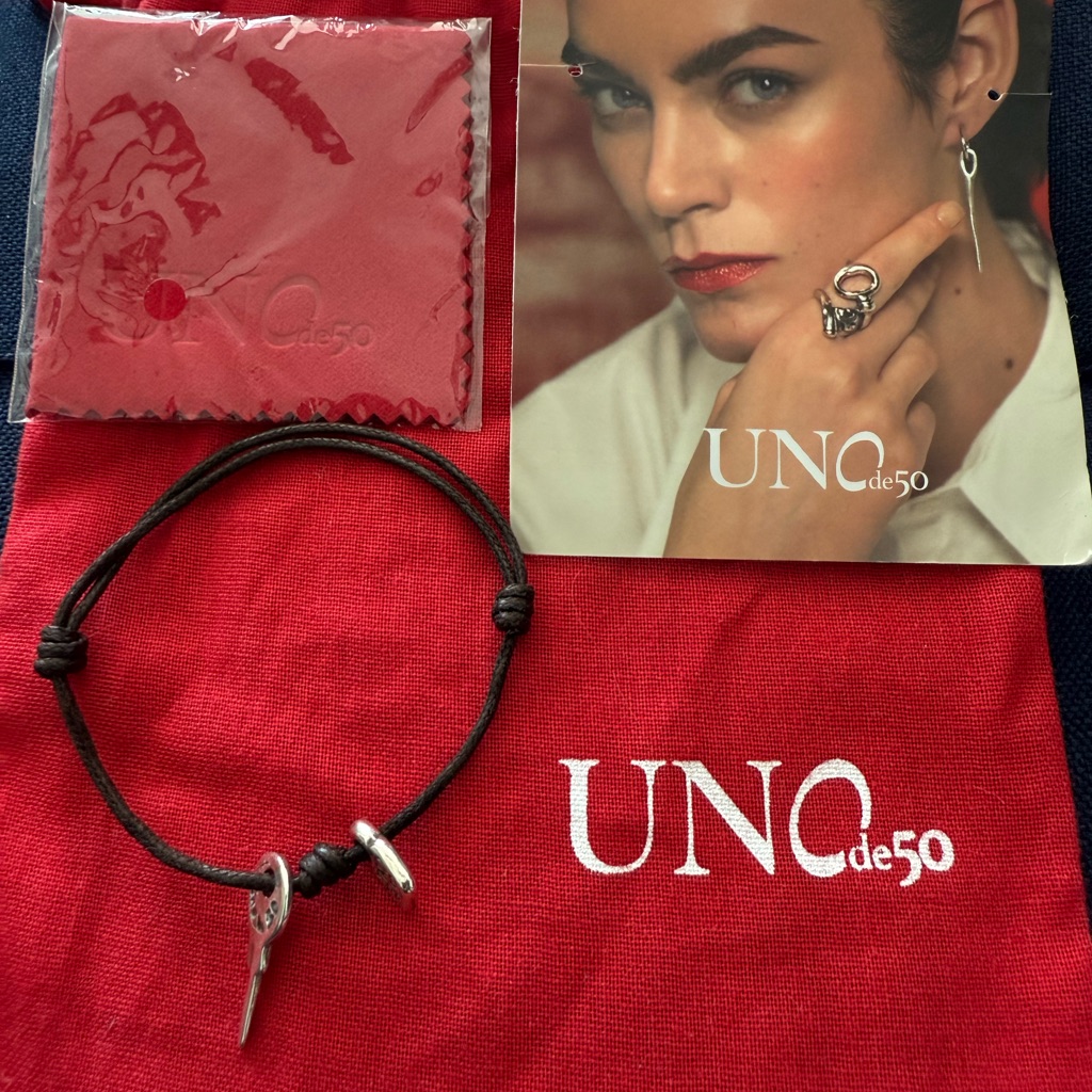 New Uno De 50 Black Cord Bracelet With Silver Lock And Key Charms.